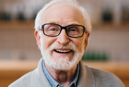 Smiling senior man with dental implants, St. Louis, MO