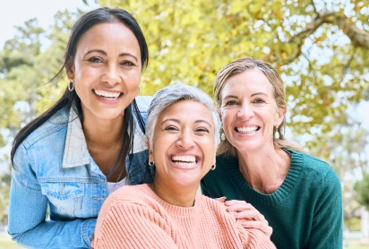Women smiling with healthy smiles at Dr. Waite and Associates